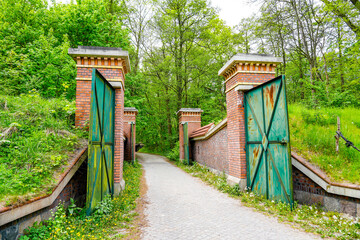 Fototapeta na wymiar Swinoujscie Fortress. Entrance with an old gate. 