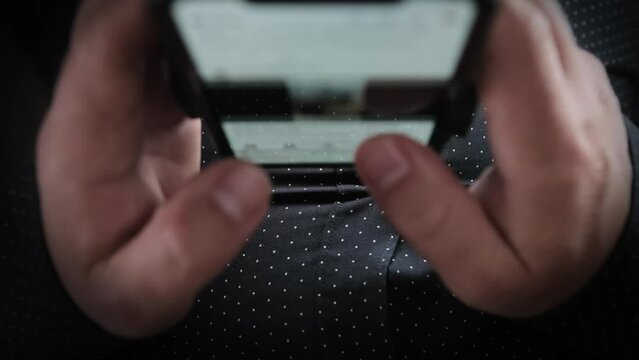 Caucasian male quickly browses online video platform close-up, top view, leaves comments and writes chat messages immersed in the world of social networks.