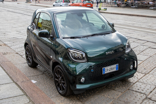smart eq fortwo car small dark little parked in street