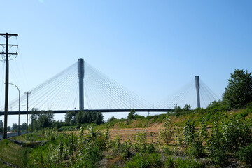 View of Port Mann going across Fraser River during a sunny winter day. Taken in Surrey, Vancouver, British Columbia, Canada. High quality 4k footage