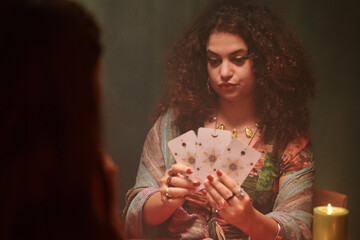 Emotional future teller doing romance and self-care tarot reading