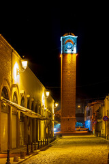 shooting with the big clock tower and night lights within the provincial borders of adana