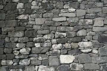 Stone wall. Background. Texture. Structure. Handmade.
