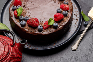 Chocolate cake dessert with fresh berries
