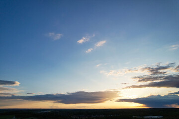 Naklejka na ściany i meble Beautiful Sky with Clouds During Sunset