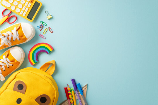 Captivate parents and educators with a striking top view photo of school bag brimming with vibrant stationery and shoes on isolated pastel blue backdrop, with copyspace for educational campaigns