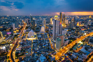 Aerial view of Saphan Taksin and Chao Phraya river in Bangkok, Thailand