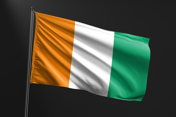 3d illustration flag of Ivory Coast. Ivory Coast flag waving isolated on black background. flag frame with empty space for your text.