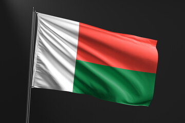 3d illustration flag of Madagascar. Madagascar flag waving isolated on black background. flag frame with empty space for your text.