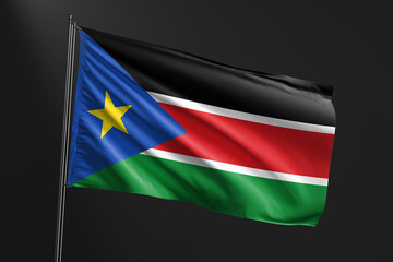 3d illustration flag of South Sudan. South Sudan flag waving isolated on black background. flag frame with empty space for your text.