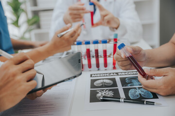 Doctor talking to colleague about vaccine in conference room at hospital