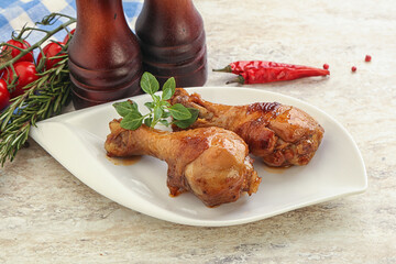 Roasted chicken legs with spicy sauce