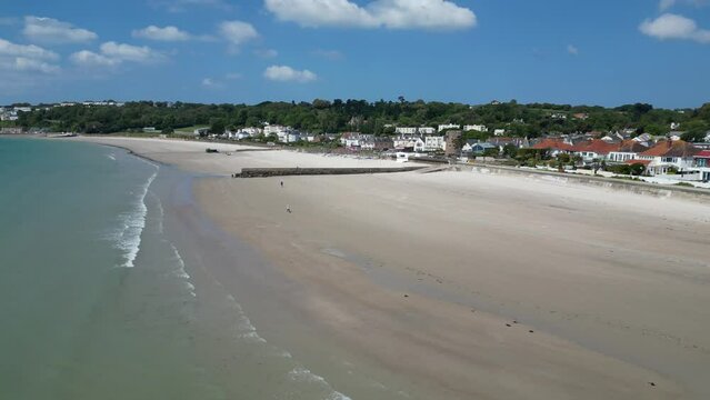Panning drone aerial 
St. Aubin's Bay Jersey channel Islands summers day