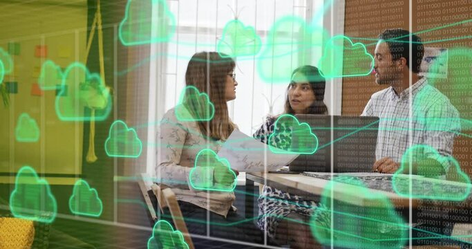 Animation of cloud icons data processing over diverse business people in office