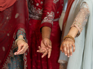 Fototapeta na wymiar Women wearing jewelry on hands during Ramadan celebration
