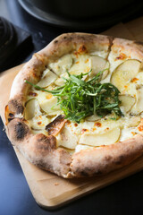 Pizza with pear and white sauce