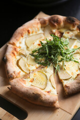 Pizza with pear and white sauce