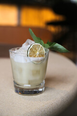 Refreshing lime cocktail with basil