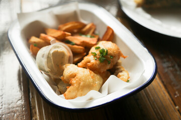 Traditional fish and chips with sauce