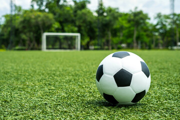 football field  ball on green grass , soccer field  background texture