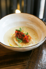 Roasted cod with vegetable salsa and cream