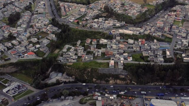 4k horizontal panning aerial shot of the interchange of general rumi&ntilde;ahui avenue in the south of Quito city, Monjas sector, Pichincha Ecuador, ishowing the traffic flow in the avenue.