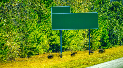 Empty interstate road sign on the left side of the road
