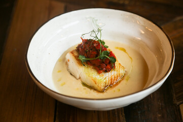 Roasted cod with vegetable salsa and cream