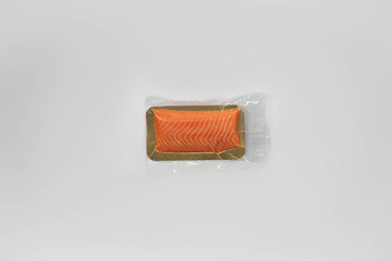 Packaged smoked salmon on white background