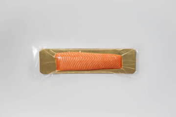 Packaged smoked salmon on white background