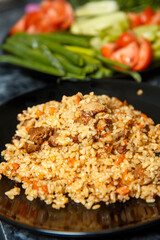 pilaf  with beef and vegetable salad