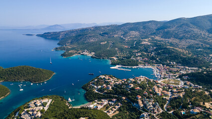 Fototapeta na wymiar Aerial view of iconic paradise sandy beaches with turquoise sea in complex islands of Agios Nikolaos and Mourtos in Sivota area, Epirus, Greece