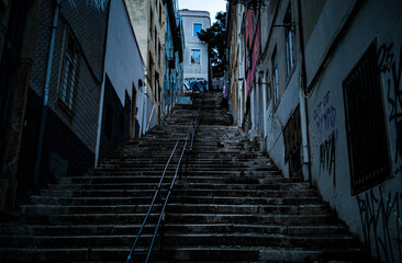 Fototapeta na wymiar Brutal, dramatic color, endless stairs in Lisbon 