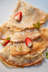 fried airy thin French pancakes.