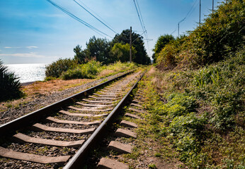Fototapeta na wymiar railroad track along sea coast. railway on south of russia