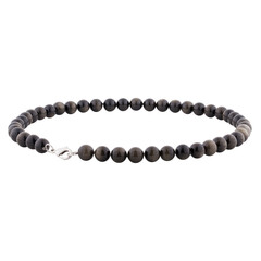 Necklace of dark stone carved on a white background