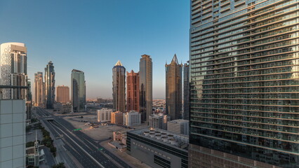 Business bay district skyline with modern architecture morning timelapse from above.