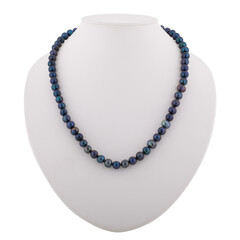 Dark mineral necklace on a white mannequin