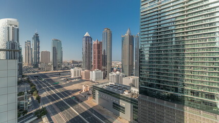 Panorama showing business bay district skyline with modern architecture timelapse from above.