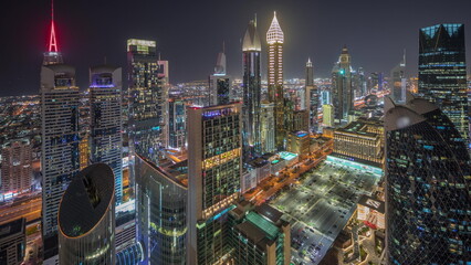 Fototapeta na wymiar Panorama showing skyline view of the high-rise buildings on Sheikh Zayed Road in Dubai aerial night timelapse, UAE.
