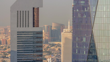 Dubai World Trade Centre on the Sheikh Zayed Road behind office towers in financial district aerial timelapse from above - obrazy, fototapety, plakaty