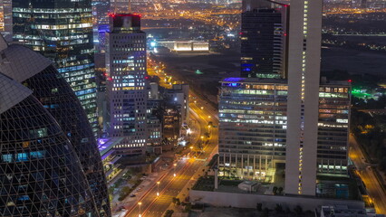 Fototapeta na wymiar Skyline view of the high-rise buildings in International Financial Centre in Dubai aerial night to day timelapse, UAE.