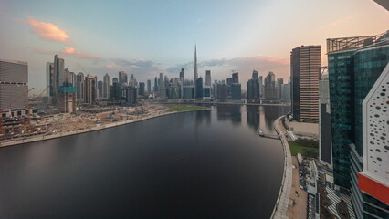 Fototapeta na wymiar Aerial view to Dubai Business Bay and Downtown with the various skyscrapers and towers timelapse