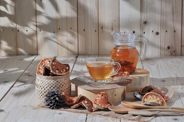 jars of quince juice quench thirstand glass tea sweet bael juice herb healthy on wood table...