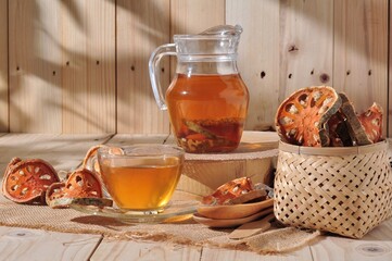 jars of quince juice quench thirstand glass tea sweet bael juice herb healthy on wood table background