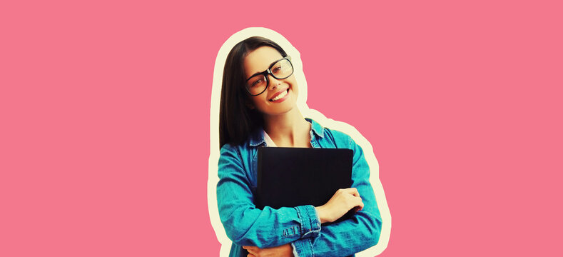 Portrait of happy smiling student young woman wearing eyeglasses with folder on pink background, magazine style