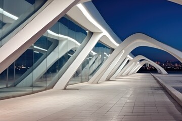 A long and wide corridor at night at architecture modern building.