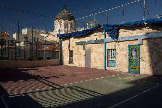 Umariya Elementary School playground, with the Ecce Homo Convent cupola in the background, in the Muslim Quarter of the Old City of Jerusalem