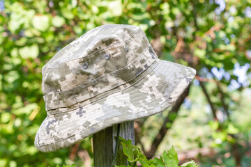 Bucket hat in camouflage coloring. Irish country hat