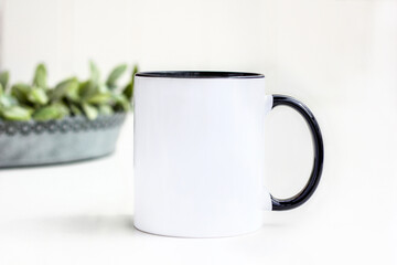Black white mug space for your text branding. Black handle mock-up for cup products presentations.